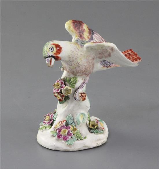 An early Derby figure of a goldfinch, c.1756, h. 12.3cm, lacking right leg and branch